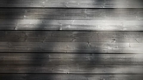 Video clip features a wooden planks background with natural lights and shadows Stock Footage 160610853