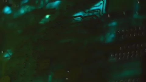 A video clip is projected onto an circuit board, highlighting the traces  库存影片 313150802