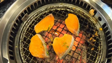 Video clip slow motion Salmon Buffet Grilling on the stove Видео 101365903