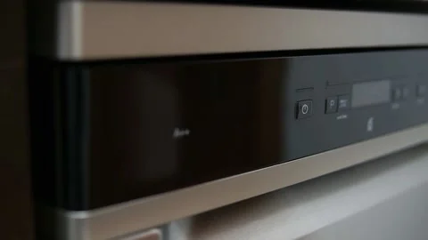 Video close focus transition from turn on power button to A plus sign of Stockbeeldmateriaal 219442604