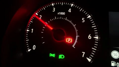 Video of Close up of illuminated car tachometer dashboard at night 스톡 동영상 330858178