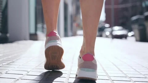 Video of close up of runner feet running on road closeup on shoe Stock Footage 296243716