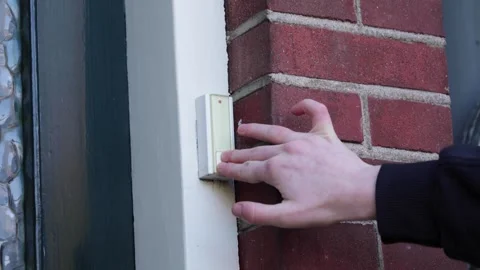 Video close up of someone pushing a doorbell button. Stock Footage 332087091