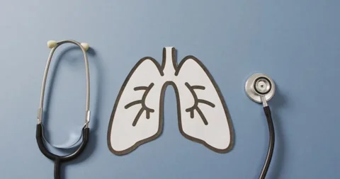 Video of close up of stethoscope with lungs on blue background Stock Footage 344324229