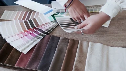 Video of close up of two beautiful young designer women working in a design p Stock Footage 154828972