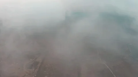 Video from the clouds, thick clouds fly low. Stock Footage 130068043