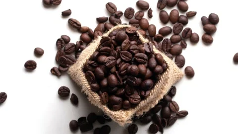Video coffee beans in the box high detail macro shot on white background Stock Footage 172385806