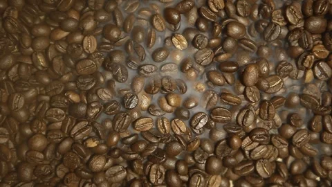 Video of coffee beans smoke Stock Footage 242685357