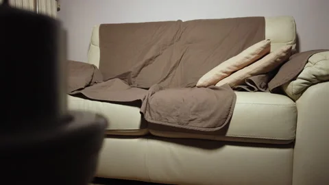 Video of a couch in disarray Stock Footage 220747002