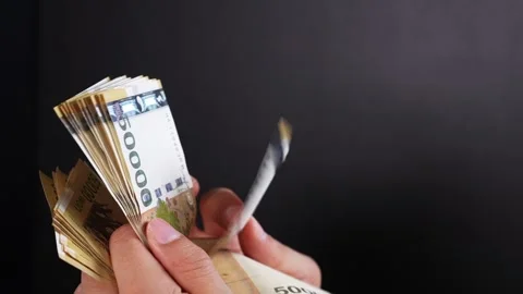 Video of counting Korean banknotes by hand Stock Footage 321866280