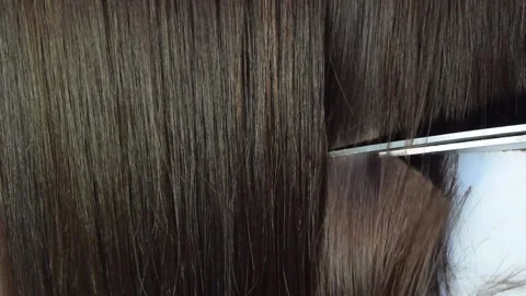 Video with cutting hair in the middle of the frame with scissors Stock Footage 160282973