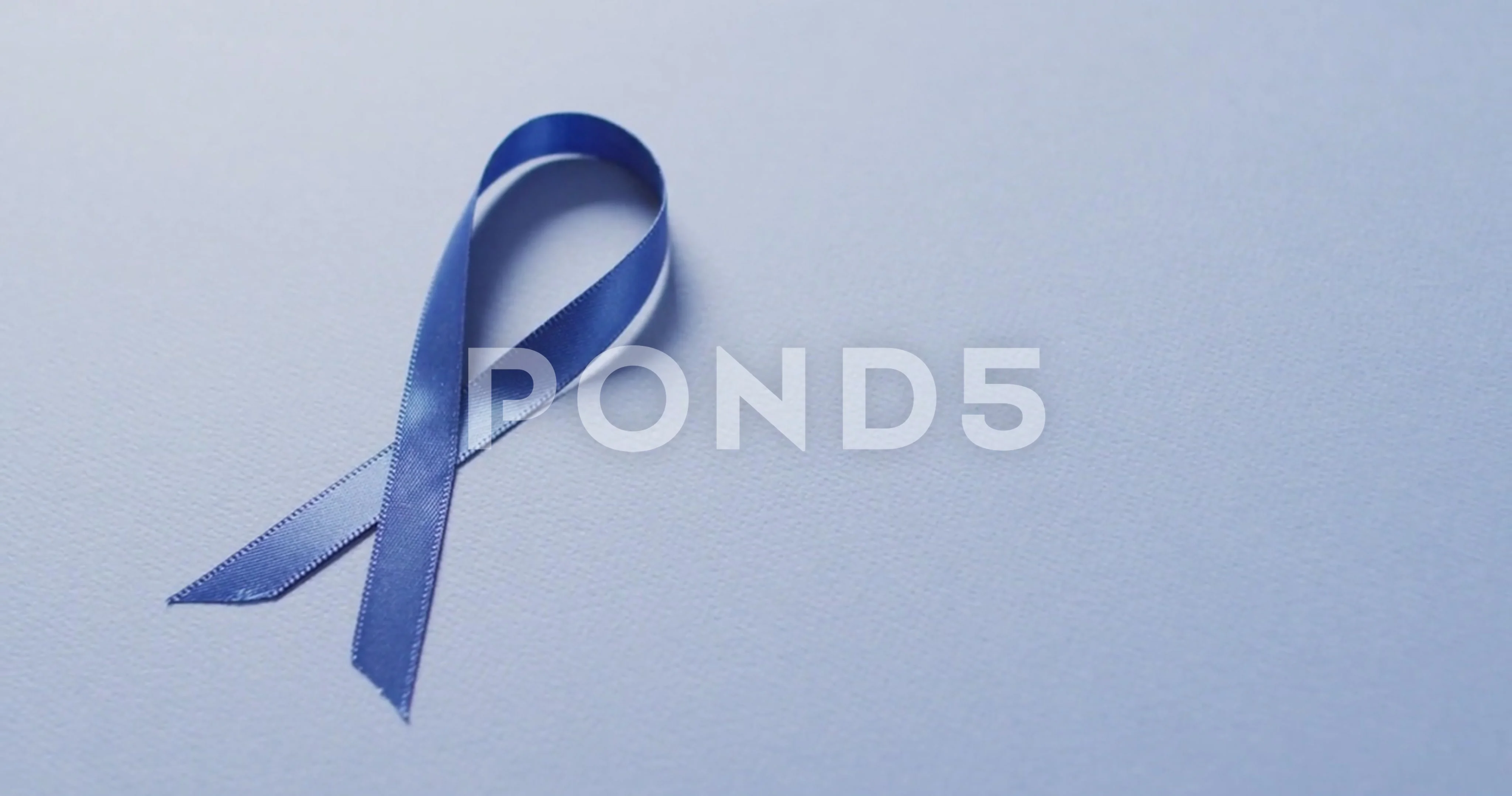 Video of dark blue colon cancer ribbon o, Stock Video