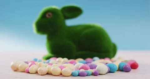 Video of decorated colorful easter eggs with bunny on a wooden surface Stock Footage 346133302