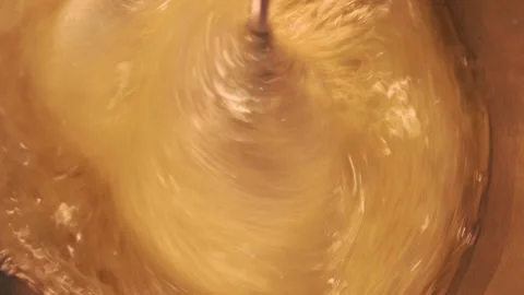 Video detail beating egg white with an electric mixer. Stock Footage 262655409
