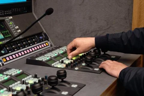 Video Director at the editing control panel, live broadcast, live broadcast Stock Photos