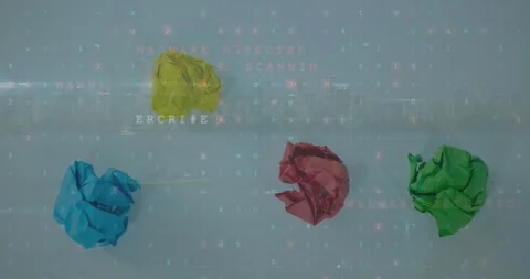 Video displays color-changing crumbled paper in data processing. Stock Footage 327964944