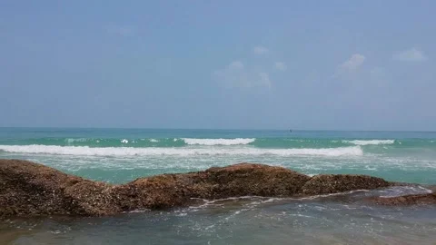 Video from a drone flying towards the waves into the ocean. Clear water at koh Stock Footage 144233852