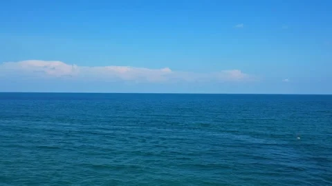 Video from a drone flying towards the waves into the ocean. Clear water at koh Stock Footage 144312795
