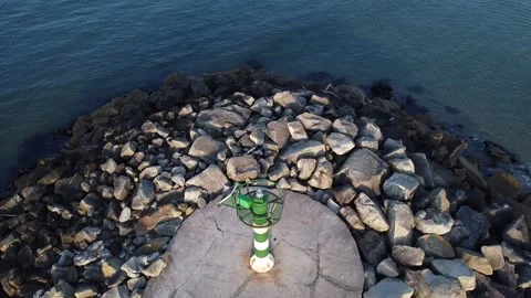 Video of drone lifting over the lantern of a breakwater Stock-Footage 246450801