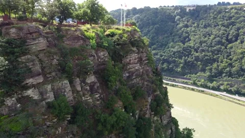Video from a drone moving away from a cliff on the Rhine in Germany. Stock Footage 157769352
