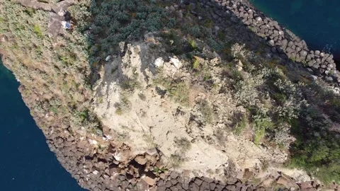 Video with drone moving away vertically from the Acitrezza stack Video stock 146803621