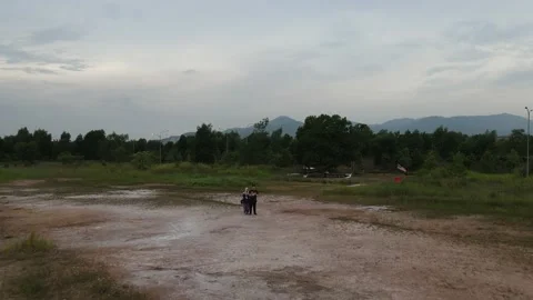 Video drone passing through a couple Stock Footage 148313054