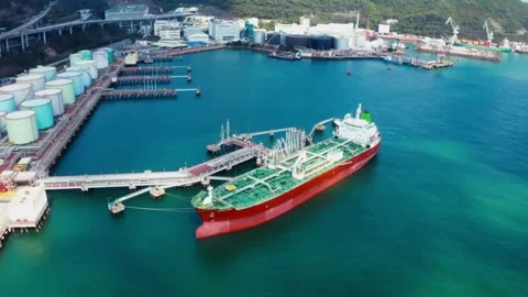 Video of Drone point of view around working harbor Oil refinery and gas ind.. Stock Footage 256671259