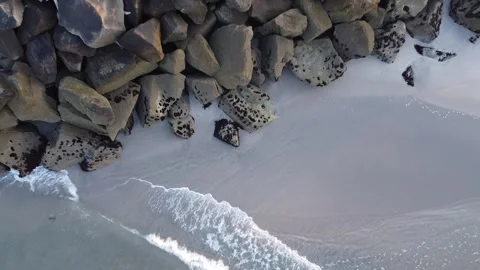 Video of drone soaring over a sea wall Stock Footage 246450802