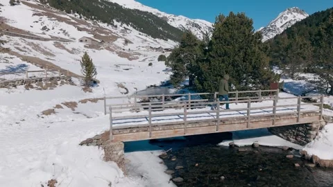 Video of drone view of a mountain landscape with a river and a village in t.. Stock Footage 245294465