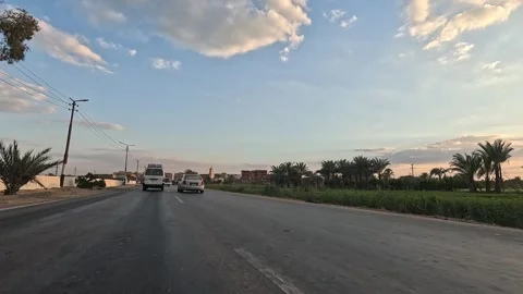 Video during steady drive Cairo Fayoum Desert Road Stock Footage 330080153