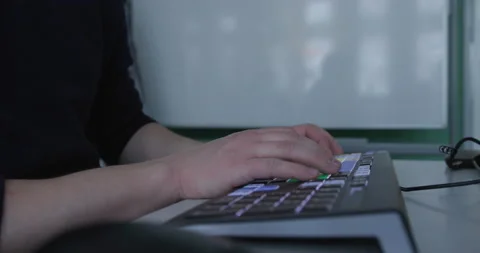 Video editor professional uses colourful computer keyboard with shortcuts Stock Footage 150410701