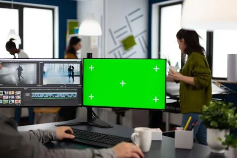 Video editor using computer with chroma key, mock up isolated display Stock Photos