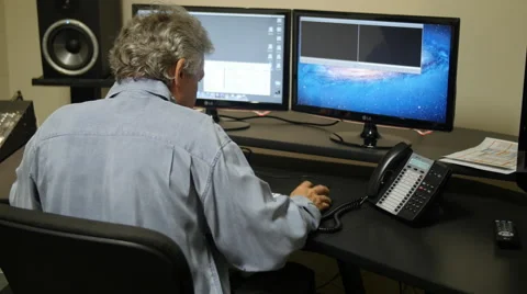 VIDEO EDITOR AT WORK 4K Stock Footage 58952945