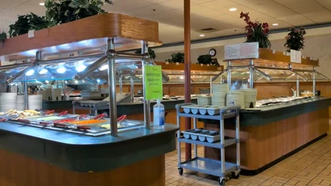 Video of an empty buffet restaurant featuring organized food stations Stock Footage 336459433