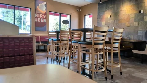Video of empty Dairy Queen dining interior with seating and windows Stock Footage 333159279