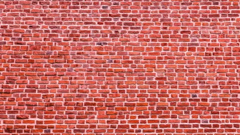 Video of empty red brick wall. Camera moving along background of red brick wall 库存影片 267162586