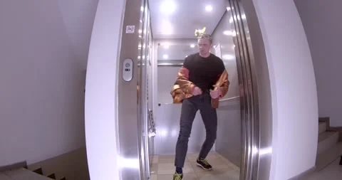 The video explores an elevator with unique characters and emotions Vídeos de archivo 313564306