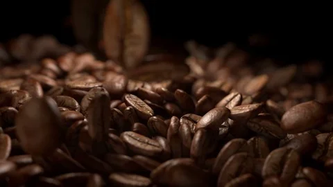 Video of falling coffee beans in real slow motion 1000fps Stock Footage 74069441