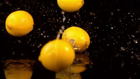 Video of falling lemons in real slow motion Stock Footage 78861754
