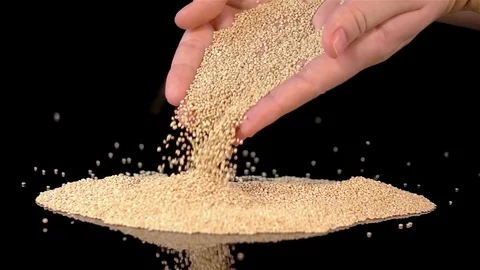 Video of falling quinoa in real slow motion Stock Footage 79478615