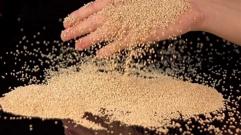 Video of falling quinoa in real slow motion Stock Footage 80592091