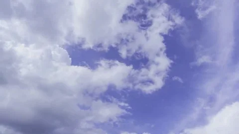 Video of fast moving clouds in a blue sky Stock Footage 69083899