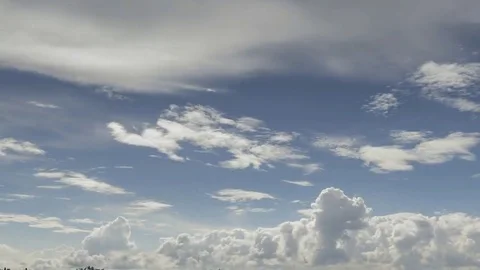 Video of fast moving clouds in a blue sky Stock Footage 69084089