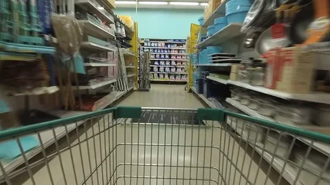 Video fast Supermarket aisle with empty green shopping cart 스톡 동영상 73755166