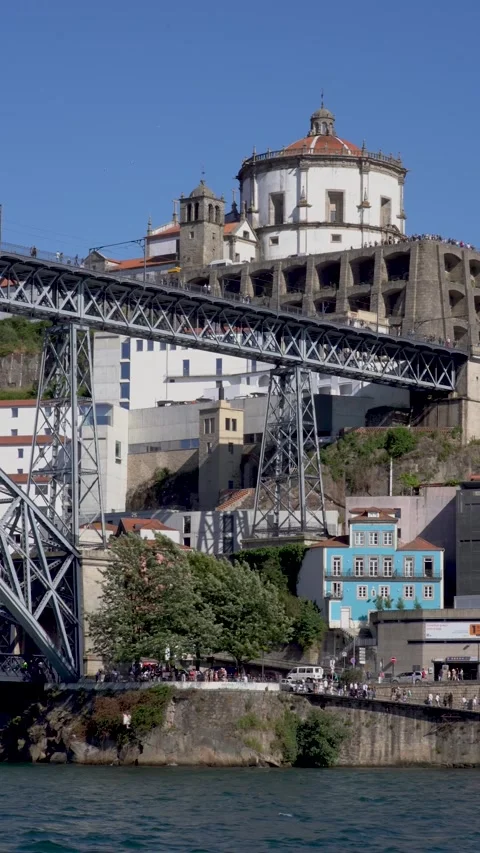 Video features a beautiful bridge over a calm river with stunning views Stock Footage 280605522