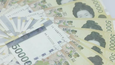 Video featuring Korean banknotes and coins Stock Footage 321848134