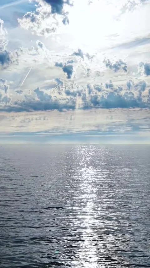 A video featuring a vast body of water with a stretching across the horizon Stock Footage 337349633