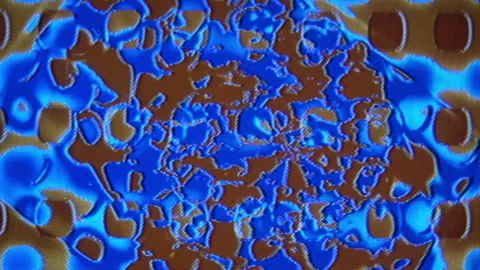 Video feedback loop with analog synthesized colors of blue and brown. Stock Footage 315013361