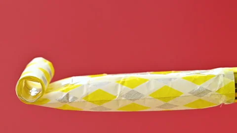 Video of a festive whistle Stock Footage 329095396