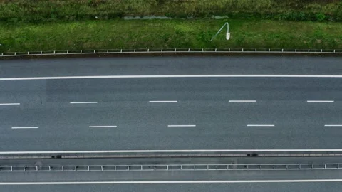 Video filming from a drone, view of the road junction with cars moving along it Stock Footage 170997798